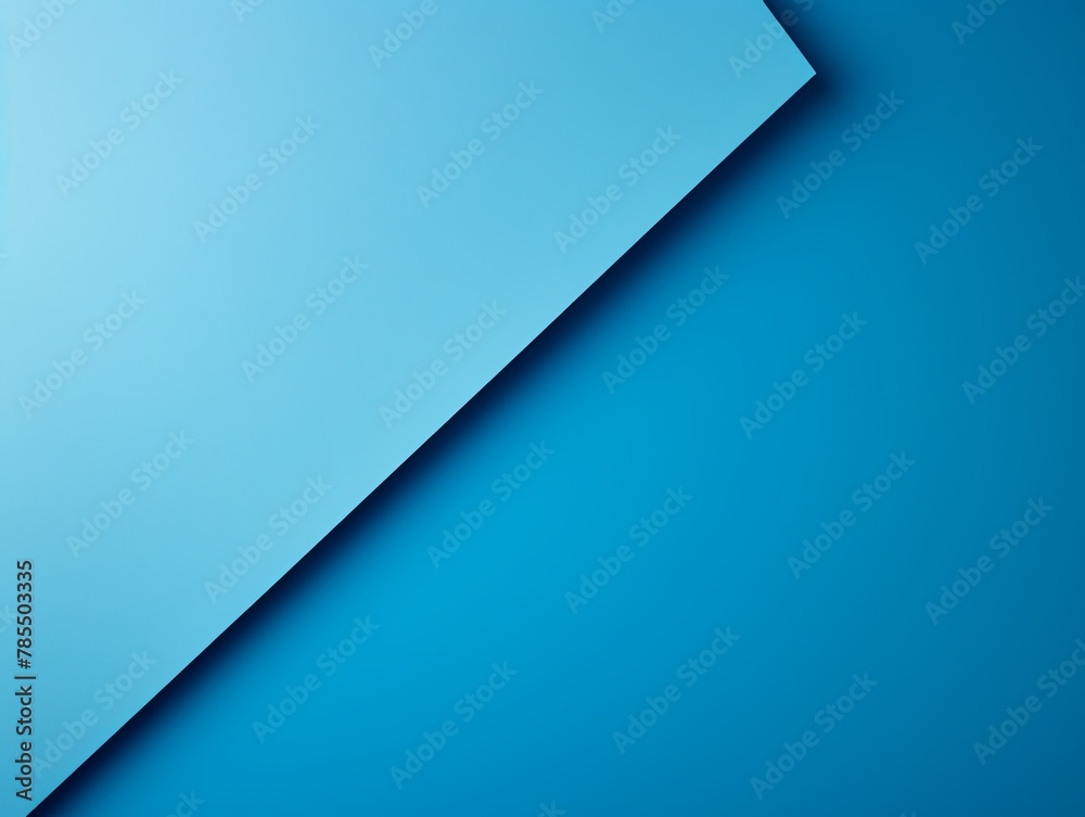 Sky Blue background with dark sky blue paper on the right side, minimalistic background, copy space concept, top view,