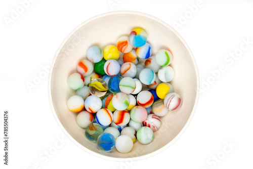 Bowl Full Of Colorful Marbles, Isolated On White Background