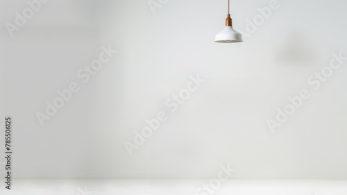 Single hanging light in a minimalist setting