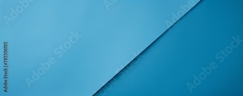 Sky Blue background with dark sky blue paper on the right side  minimalistic background  copy space concept