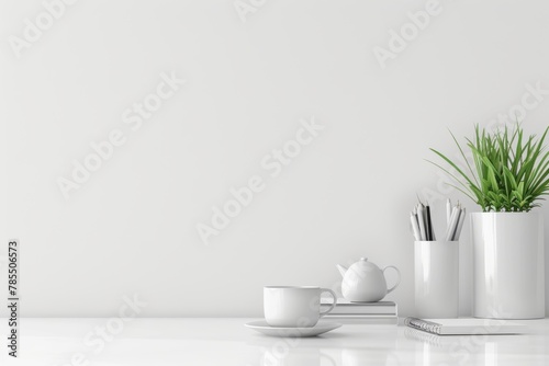 Minimalist white desk with potted plant  coffee cup  and neatly arranged office supplies