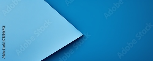 Sky Blue background with dark sky blue paper on the right side  minimalistic background  copy space concept