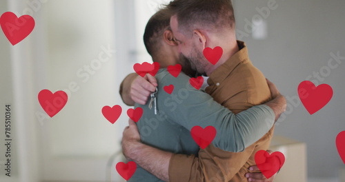 Image of heart icons over diverse gay couple embracing