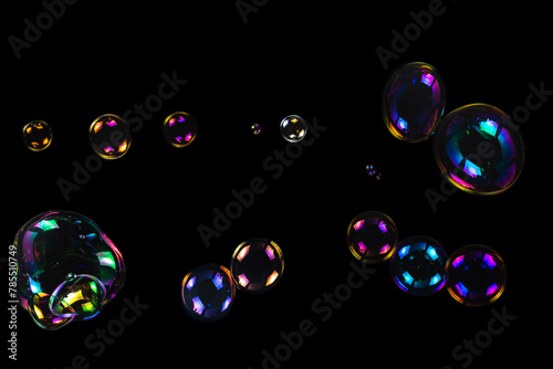 Soap bubbles isolated on a black background © Nikolay