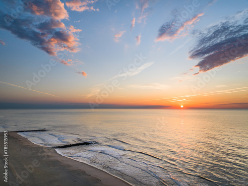 Sunrise over the ocean with beautiful clear skies
