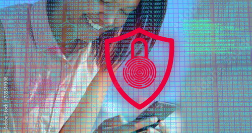 Image of number and digital padlock over hands of asian woman using smartphone