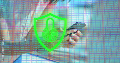 Image of number and digital padlock over hands of asian woman using smartphone
