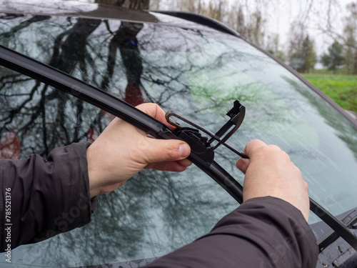 Photography Replacement of car windshield wipers