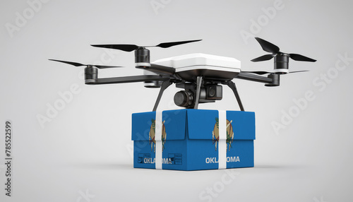 A drone carrying a box with the Oklahoma flag, symbolizing the future of e-commerce and logistics
