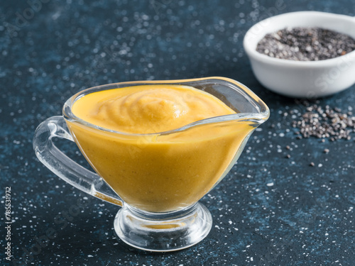 Vegan creamy cheddar cheese sauce with chia seeds