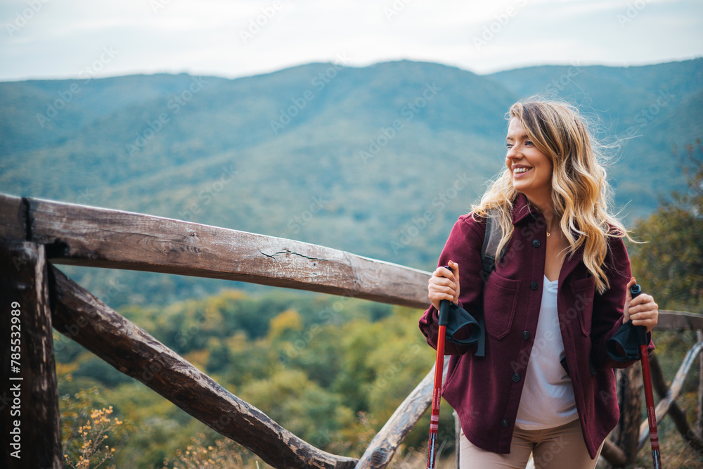 © Dragana Gordic - Beautiful mountains, standing young woman with backpack on the peak at sunsetLandscape with sporty girl, green grass, forest, hills , blue sky with sunbeams. Travel and tourism © Dragana Gordic - Beautiful mountains, standing young woman with backpack on the peak at sunsetLandscape with sporty girl, green grass, forest, hills , blue sky with sunbeams. Travel and tourism