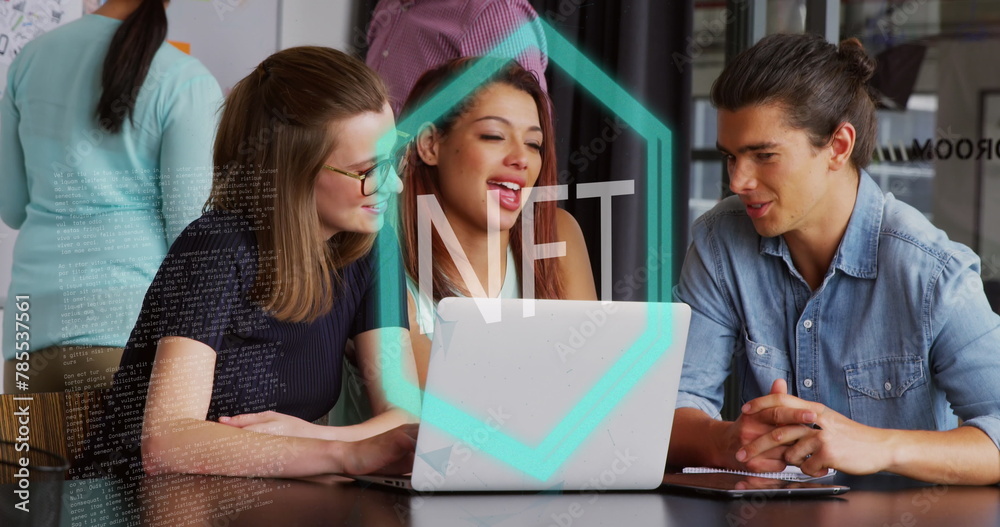 Image of nft text banner against diverse colleagues discussing together at office Image of nft text banner against diverse colleagues discussing together at office