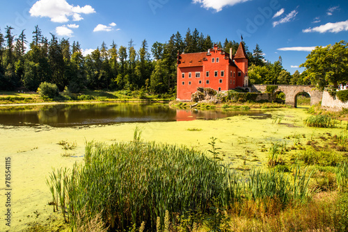 The Cervena (Red) Lhota Chateau is a beautiful and unique example of Renaissance architecture. It is located in the South Bohemian Region of the Czech Republic, surrounded by a picturesque lake. photo