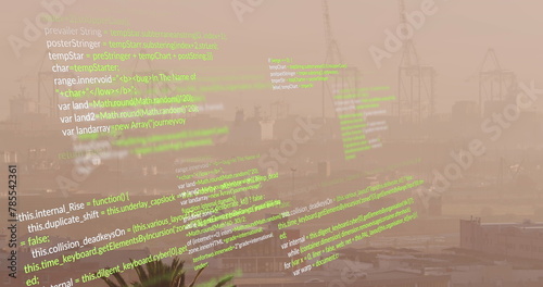 Image of looping computer language over fog covered modern city against sky