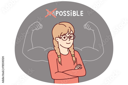 Proud little girl stands with arms crossed near inscription impossible is possible and muscular arms drawn on blackboard. Schoolgirl teenager successfully cope with challenge and gained new knowledge © drawlab19