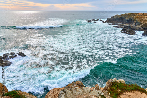 land and seascape at the rocky coastline of the Atlantic Ocean near Porto Covo near Sines, Portugal, Europe photo