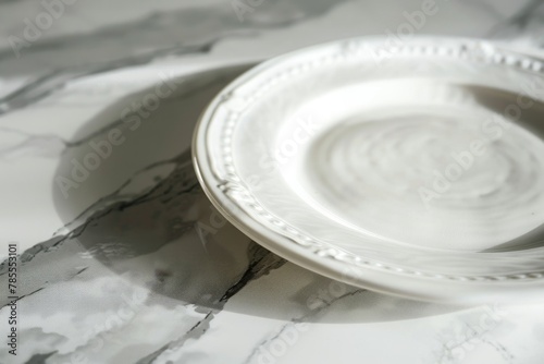 Close-Up of Pristine White Plate on Marble Background