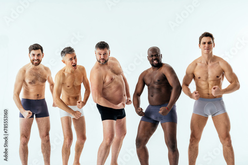 Fotografía Group of multiethnic men posing for a male edition body positive beauty set