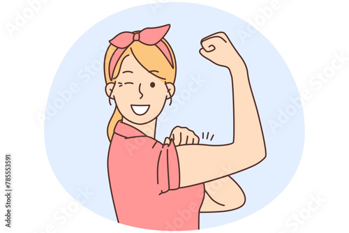Smiling woman show muscles feeling powerful