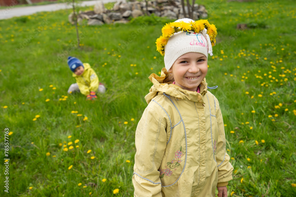 girl in a yellow jacket in a field of dandelions, spring, field of flowers, childhood, child playing with flowers, girl in a yellow jacket in a field of dandelions, spring, field of flowers, childhood, child playing with flowers,