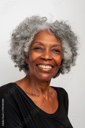 Cheeky black senior woman with afro hair