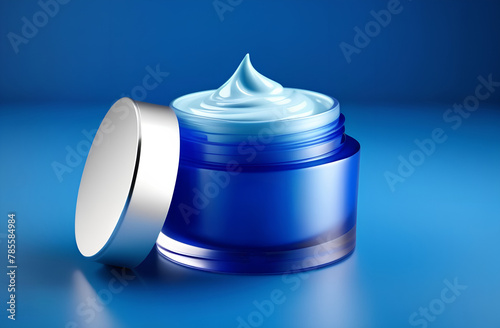 Face cream moisturiser in a container on blue background, body care and skincare cosmetic product.