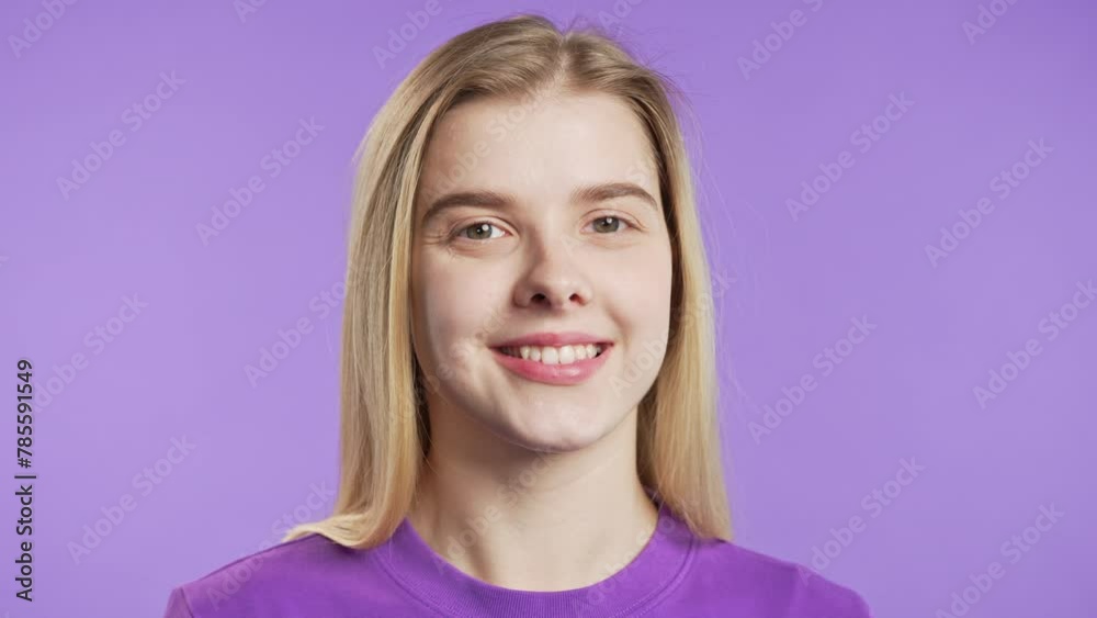 Friendly young woman with blonde hair showing yes signal,approve. Charming lady. Friendly young woman with blonde hair showing yes signal,approve. Charming lady.