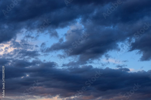 Blue dark clouds in the sky before the rain, evening, twilight
