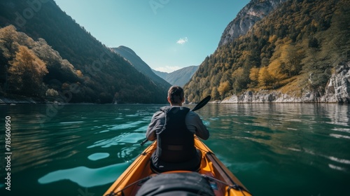 Person Kayaking on Lake photo