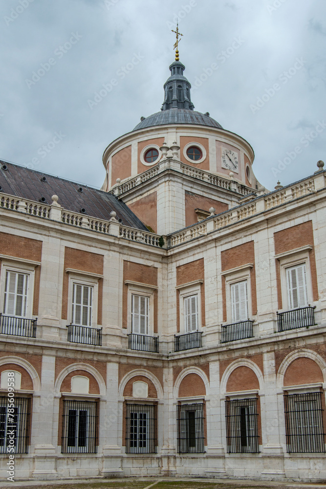 Corner with windows. balconies and dome from one of the patios of the royal palace of Aranjuez in Aranjuez, province of Madrid. Spain