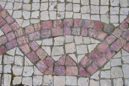 background with cobblestones in two colors formed a mosaic with a border