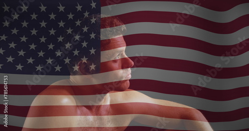 Image of flag of usa over caucasian man looking up