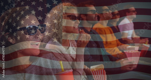 Image of flag of usa over happy caucasian people with pop corn watching movie in cinema
