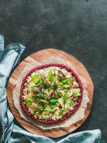 beetroot pizza crust with fresh mangold leaves photo