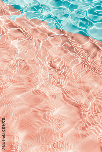 Flat lay of wavy water surface on pastel blue and peach fuzz background. Beach summer concept
