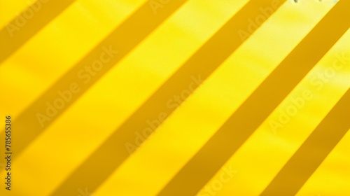 Yellow laconic background with falling striped shadows