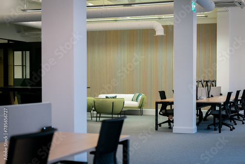 Modern office interior with meeting area and workspace