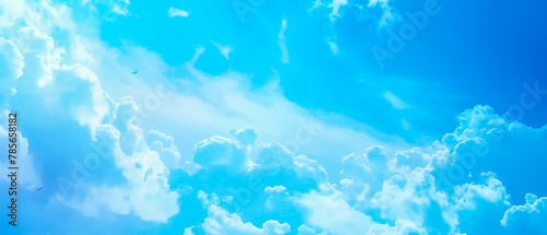  Light blue background .Bright blue background. Sky on a bright day. Blue sky and cloud. Blue sky back ground. The softness of the clouds and the brightness of the sky. 