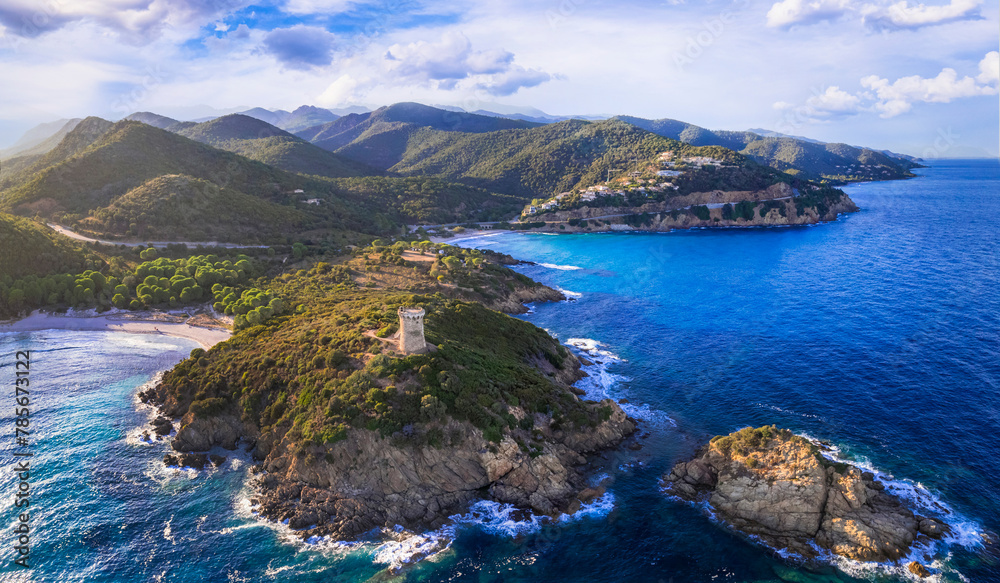Scenic nature and beaches of Corsica island. Genoese towers  - Torra di Fautea over sunset. aerial drone panoramic view