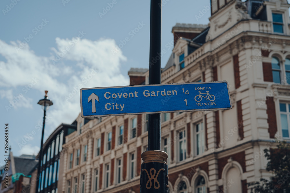 Cycling route to Covent Garden and City sign on a street in London, UK.