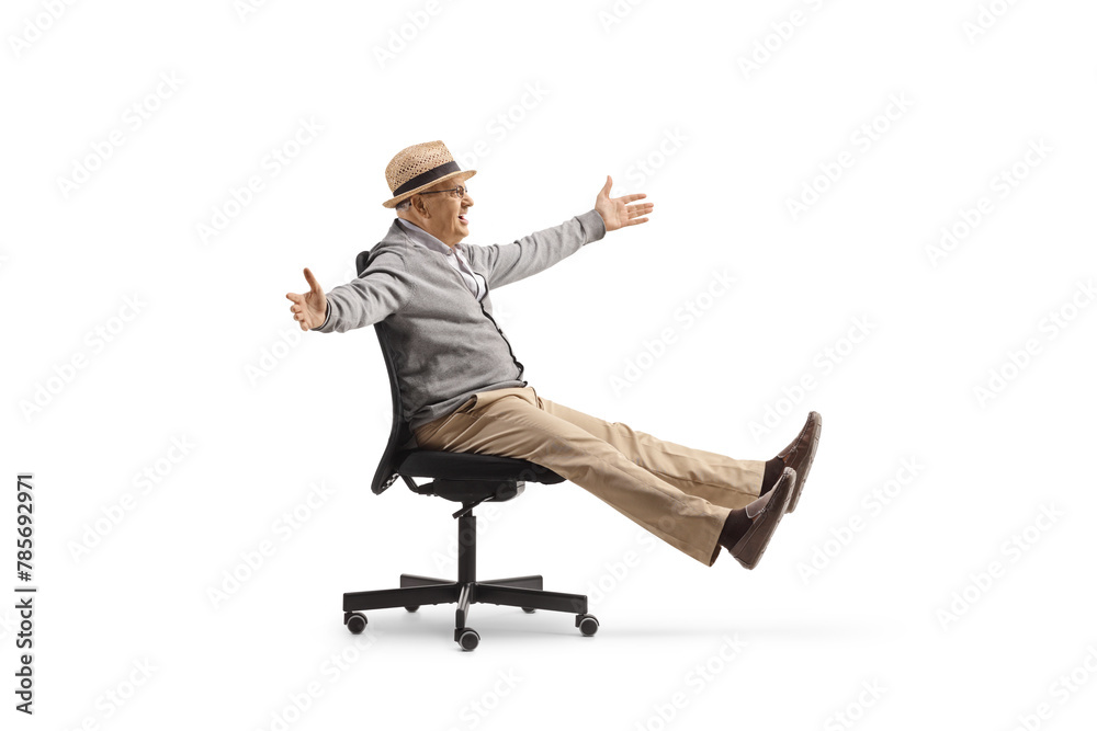 Excited elderly man sitting in an office chair