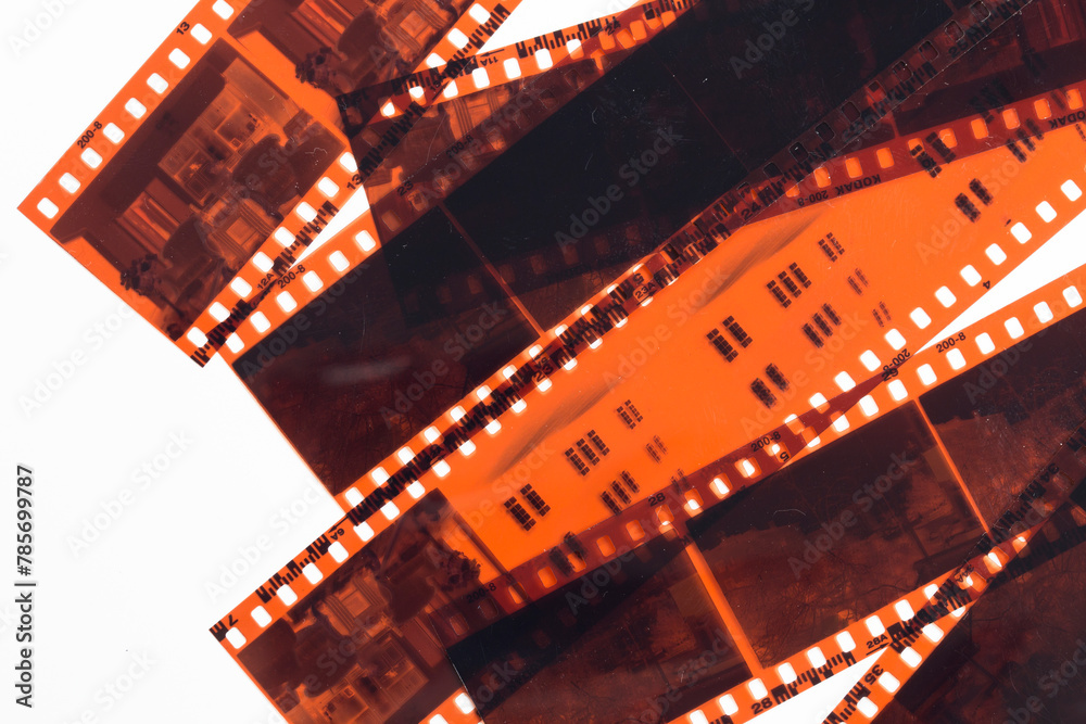35mm positive filmstrips with empty frames, real scan of film material with cool scanning light interferences on the material. 
