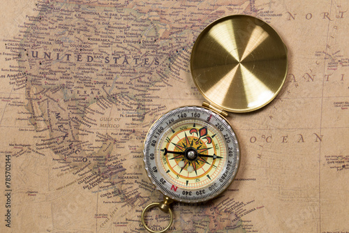 Retro vintage compass with vintage map 