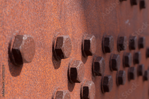bolts screwed on steel plates