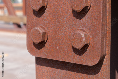 bolts screwed on steel plates