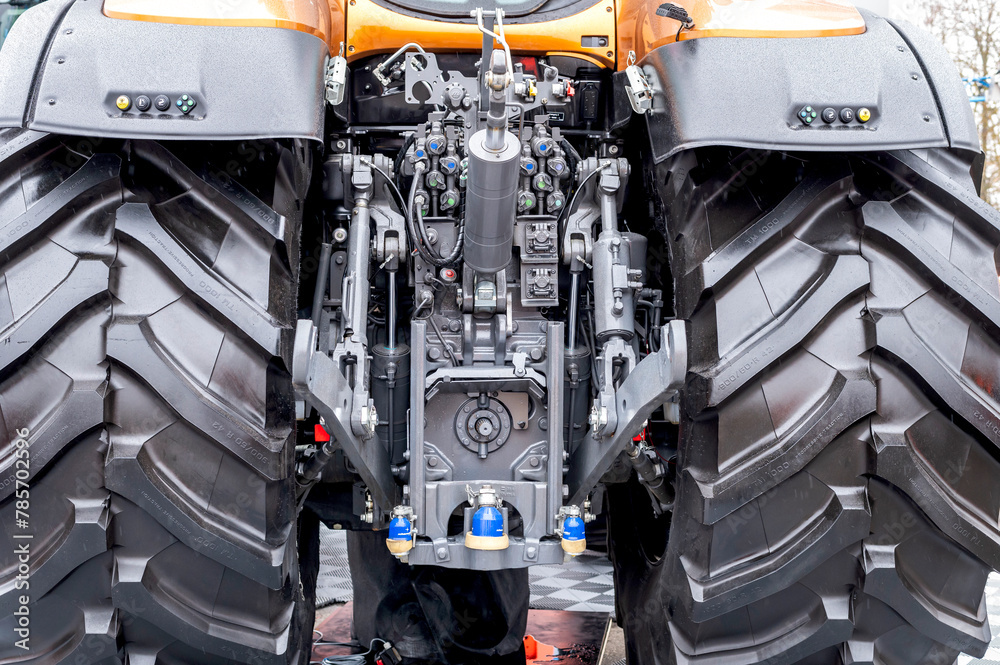 Detailed close-up of the rear part of a modern Valtra tractor, focusing ...