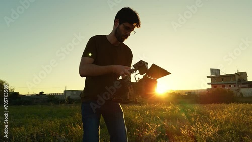 filmmaker in action at sunset light 