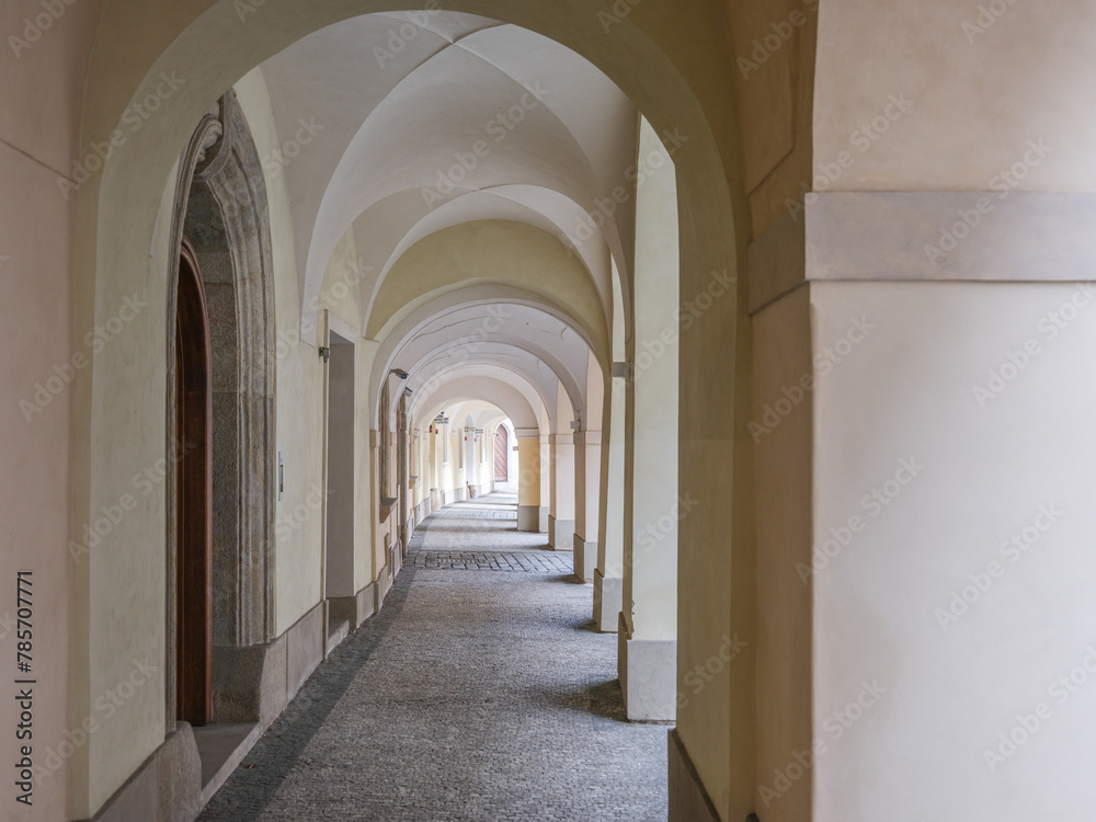 Empty walk way with traditional building arches in Prague, czech republic