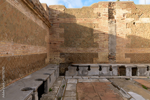 Canvas Print Ancient public toulet in Ostia Antica - ancient roman city and port