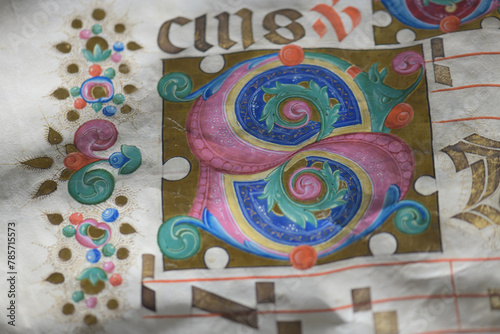 Detail with initial letter from illuminated antiphonary manuscrip photo